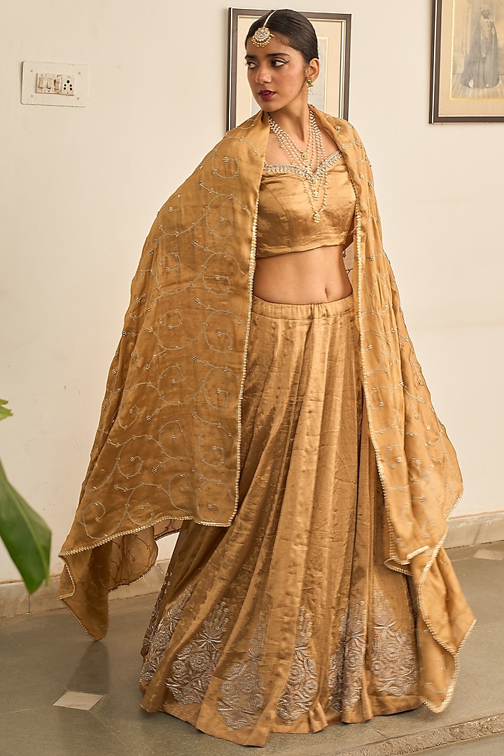 Gold Tissue Zardosi Hand Embroidered Lehenga Set by Apeksha Jain Label