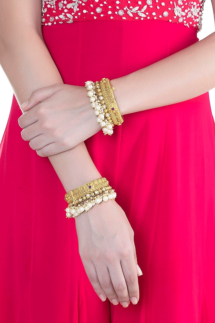 Gold Finish Onyx Stones & Pearls Bangles by Anjali Jain Jewellery