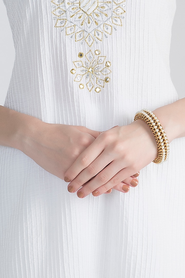 Gold Polish Beads & Pearls Bangles by Anjali Jain Jewellery