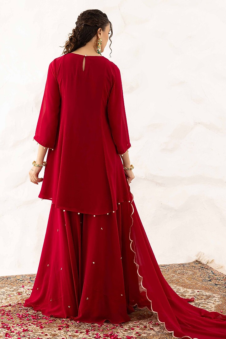 Plum Georgette Floral Embroidered Peplum Kurta Set by Ajiesh Oberoi at Pernia's Pop Up Shop