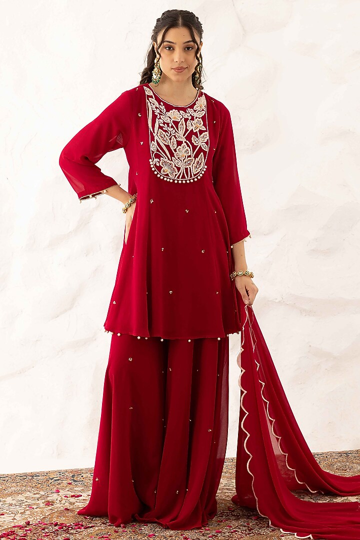 Plum Georgette Floral Embroidered Peplum Kurta Set by Ajiesh Oberoi at Pernia's Pop Up Shop