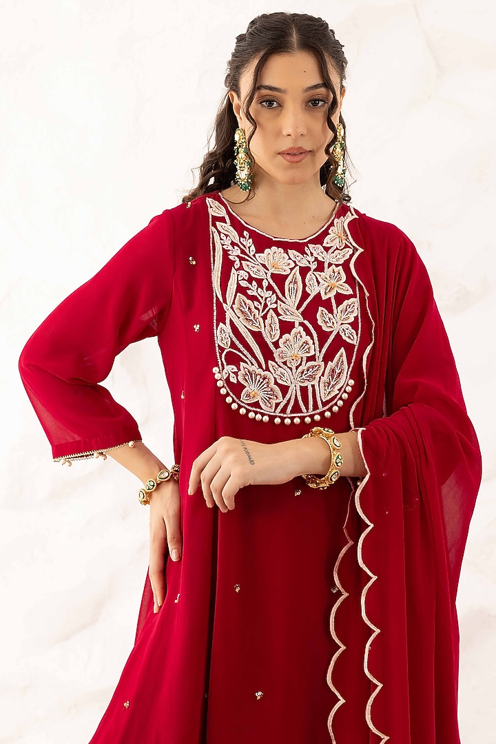 Plum Georgette Floral Embroidered Peplum Kurta Set by Ajiesh Oberoi at Pernia's Pop Up Shop