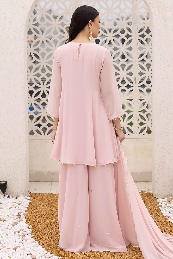 Rose Pink Georgette Floral Embroidered Peplum Kurta Set by Ajiesh Oberoi at Pernia's Pop Up Shop