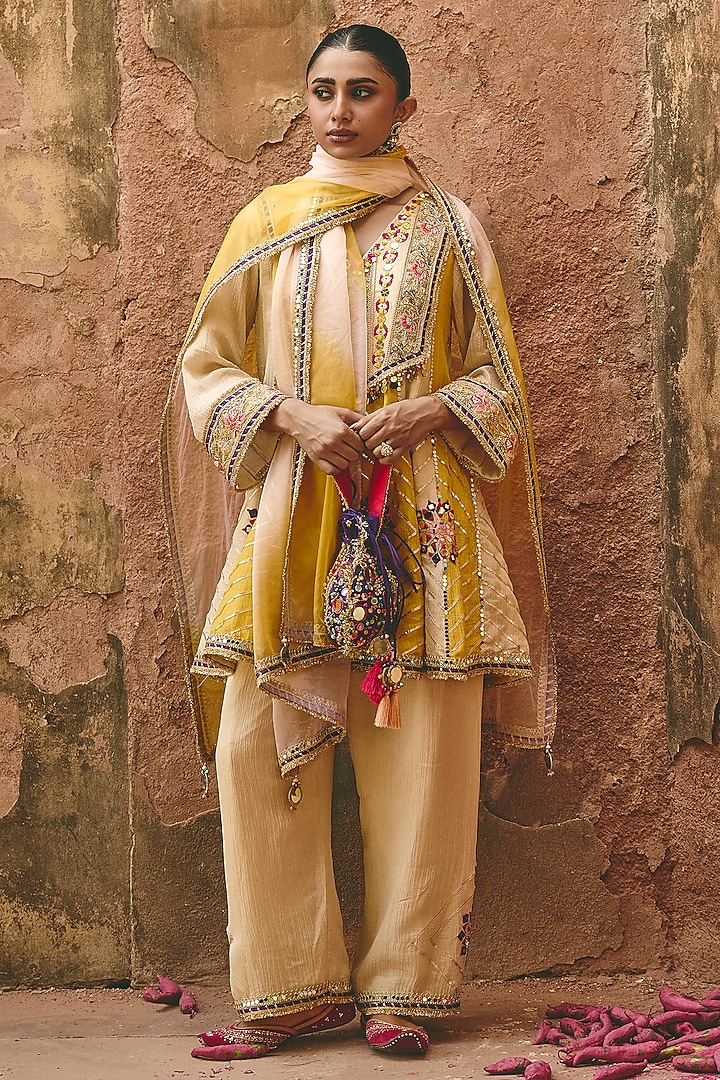 Ivory & Sunshine Yellow Crinkle Tissue Embroidered Peplum Kurta Set by Ajiesh Oberoi at Pernia's Pop Up Shop