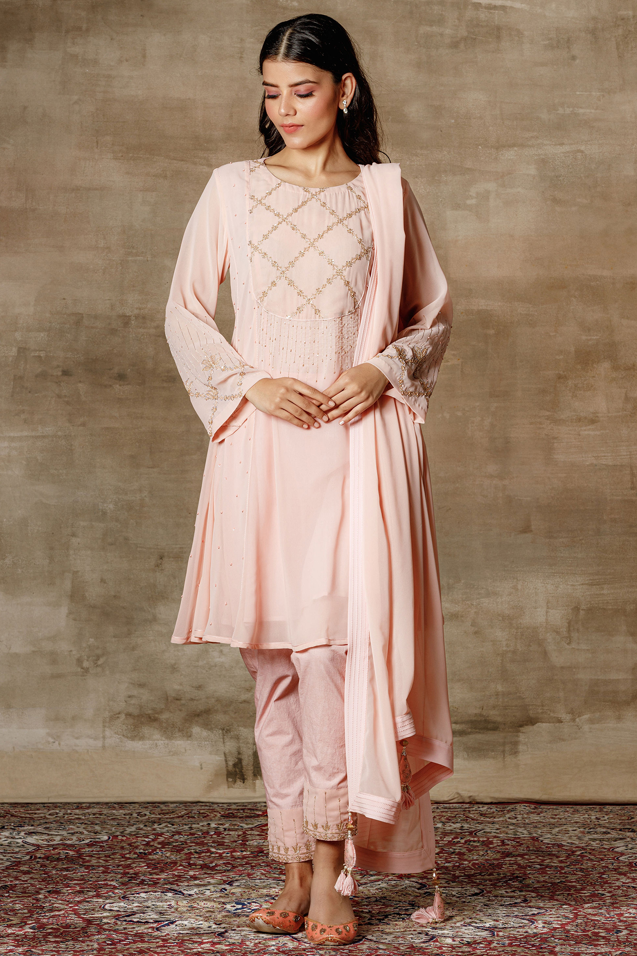 Peach Embroidered Flared Kurta Set by Ajiesh Oberoi at Pernia's Pop Up Shop