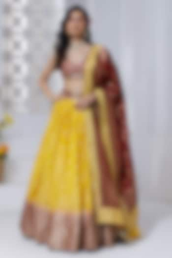 Yellow Silk Brocade Hand Embroidered & Floral Printed Wedding Lehenga Set by AJAY & PRIYANKA at Pernia's Pop Up Shop