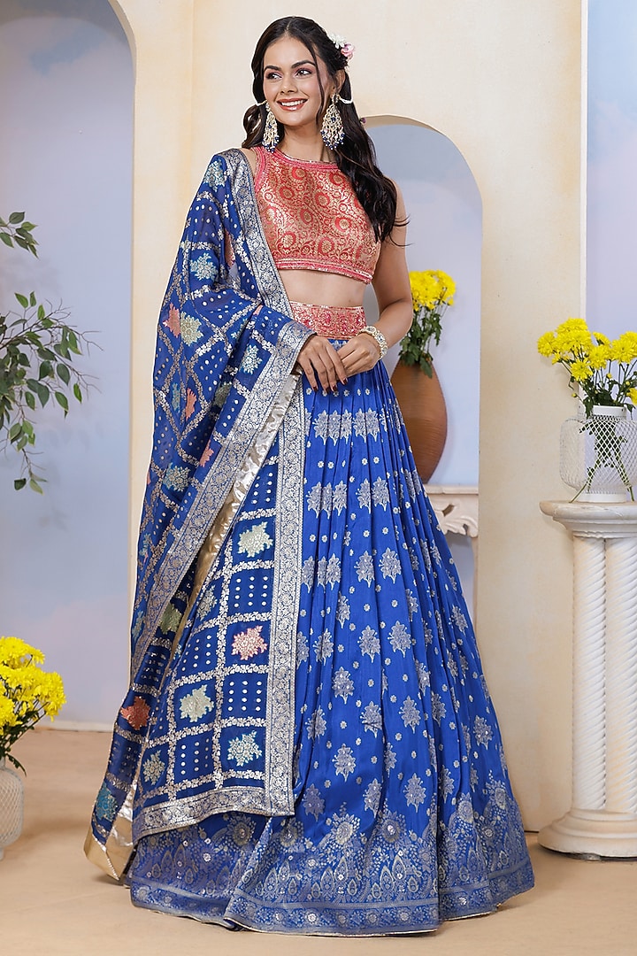 Royal Blue Silk Brocade Hand Embroidered & Floral Printed Wedding Lehenga Set by AJAY & PRIYANKA at Pernia's Pop Up Shop