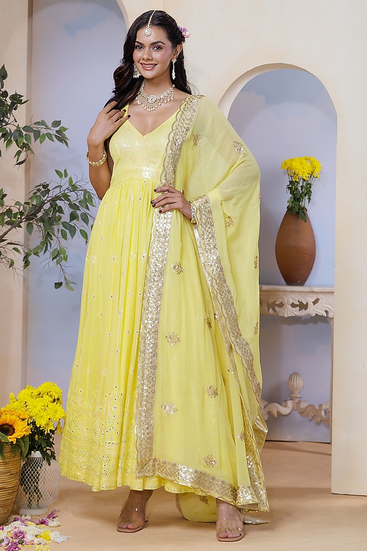 Yellow Georgette Hand Embroidered & Floral Printed Kurta Set by AJAY & PRIYANKA at Pernia's Pop Up Shop