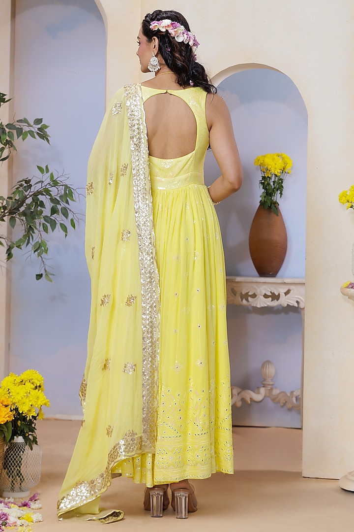 Yellow Georgette Hand Embroidered & Floral Printed Kurta Set by AJAY & PRIYANKA at Pernia's Pop Up Shop