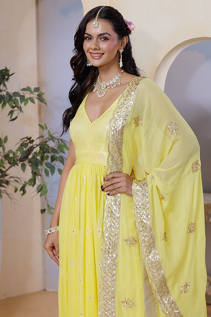 Yellow Georgette Hand Embroidered & Floral Printed Kurta Set by AJAY & PRIYANKA at Pernia's Pop Up Shop
