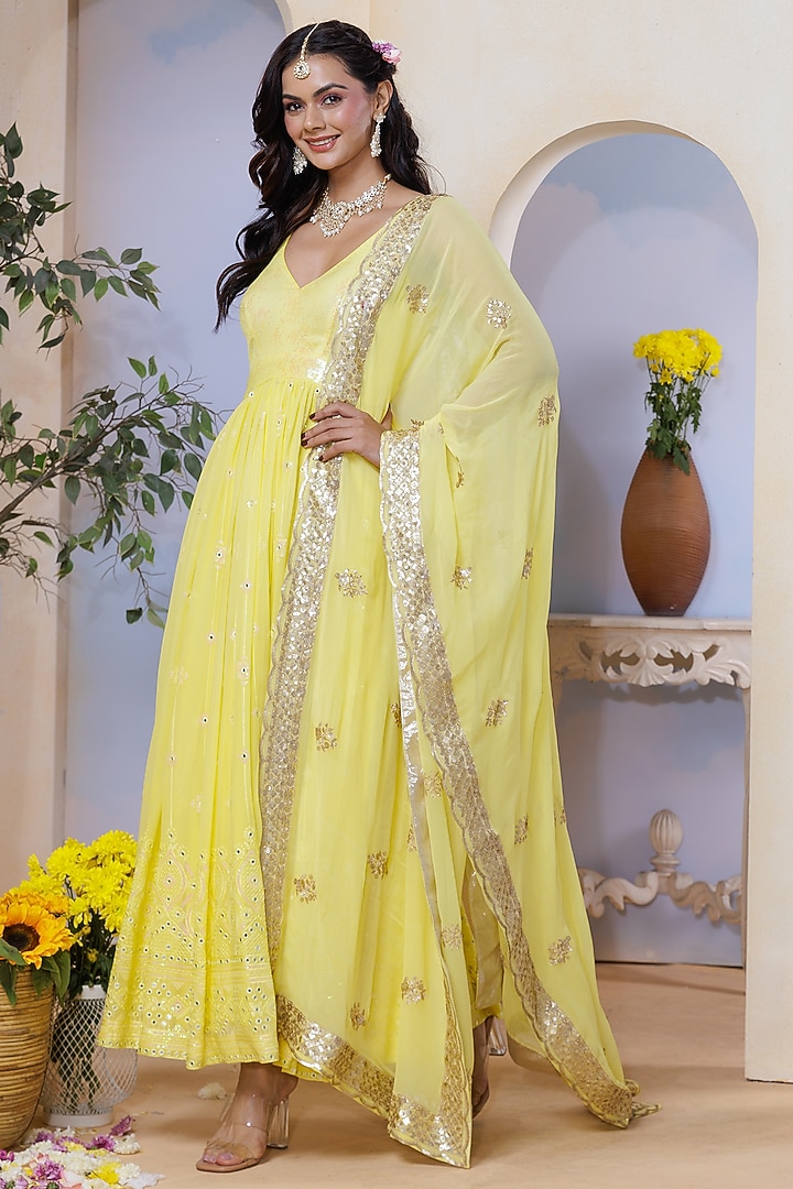 Yellow Georgette Hand Embroidered & Floral Printed Kurta Set by AJAY & PRIYANKA at Pernia's Pop Up Shop