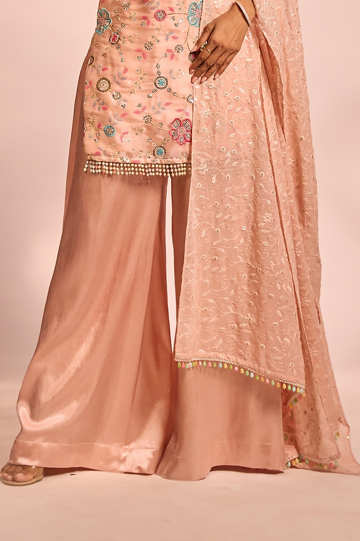 Peach Modal Satin Hand Embellished Party Wear Sharara Set by AJAY & PRIYANKA at Pernia's Pop Up Shop