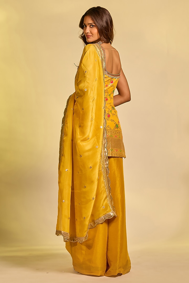 Mustard Yellow Tissue Hand Embellished Party Wear Sharara Set by AJAY & PRIYANKA at Pernia's Pop Up Shop