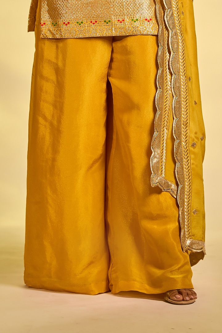 Mustard Yellow Tissue Hand Embellished Party Wear Sharara Set by AJAY & PRIYANKA at Pernia's Pop Up Shop