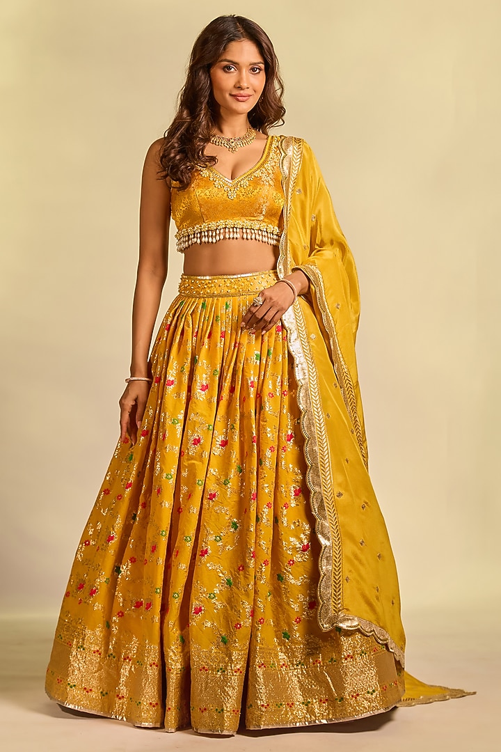 Mustard Yellow Brocade Hand Embellished Wedding Lehenga Set by AJAY & PRIYANKA at Pernia's Pop Up Shop