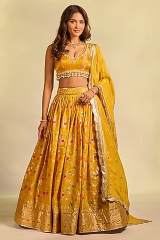 Mustard Yellow Brocade Hand Embellished Lehenga Set by AJAY & PRIYANKA