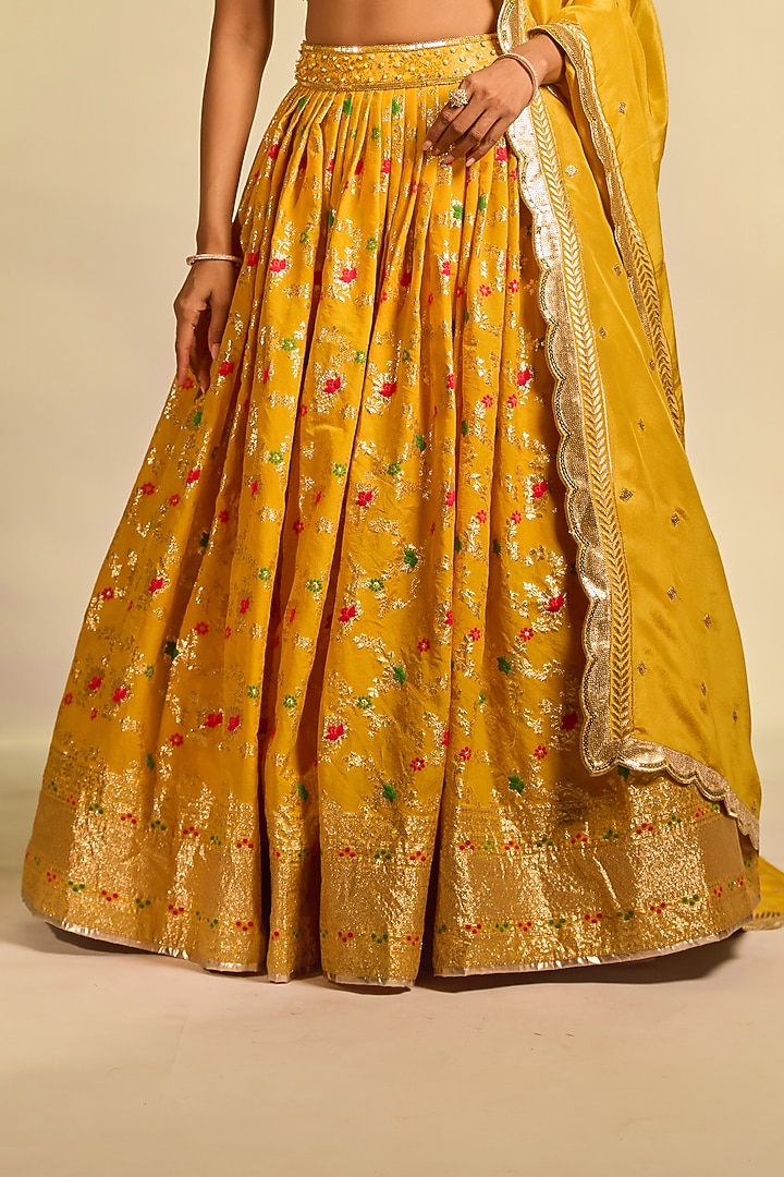 Mustard Yellow Brocade Hand Embellished Wedding Lehenga Set by AJAY & PRIYANKA at Pernia's Pop Up Shop