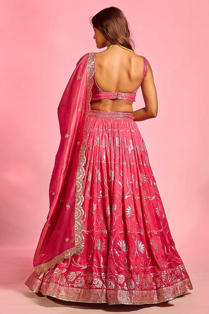 Rani Pink Brocade Hand Embellished Wedding Lehenga Set by AJAY & PRIYANKA at Pernia's Pop Up Shop