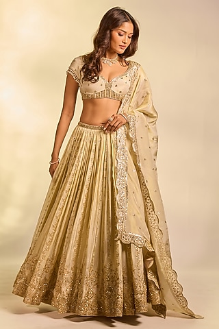 Gold Tissue Hand Embellished Lehenga Set by AJAY & PRIYANKA