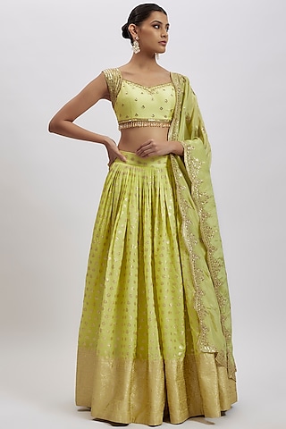 Lemon Yellow Silk Brocade Hand Embellished Lehenga Set by AJAY & PRIYANKA