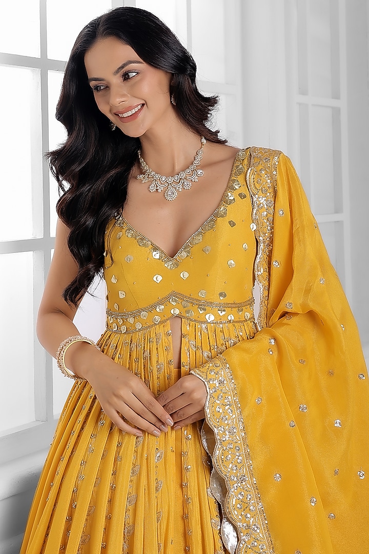 Yellow Tissue Silk Cutdana Embellished Wedding Lehenga Set by AJAY & PRIYANKA at Pernia's Pop Up Shop