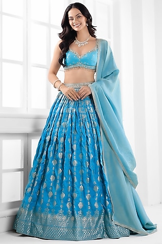 Ice Blue Silk Brocade Cutdana Embellished Lehenga Set by AJAY & PRIYANKA