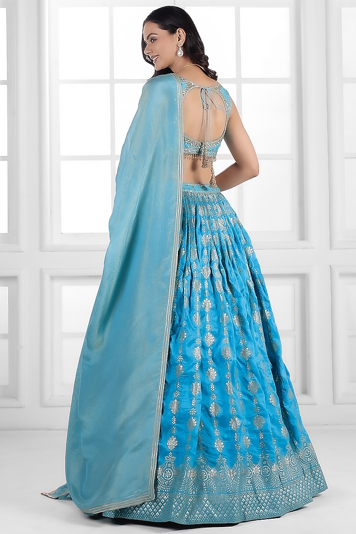 Ice Blue Silk Brocade Cutdana Embellished Wedding Lehenga Set by AJAY & PRIYANKA at Pernia's Pop Up Shop