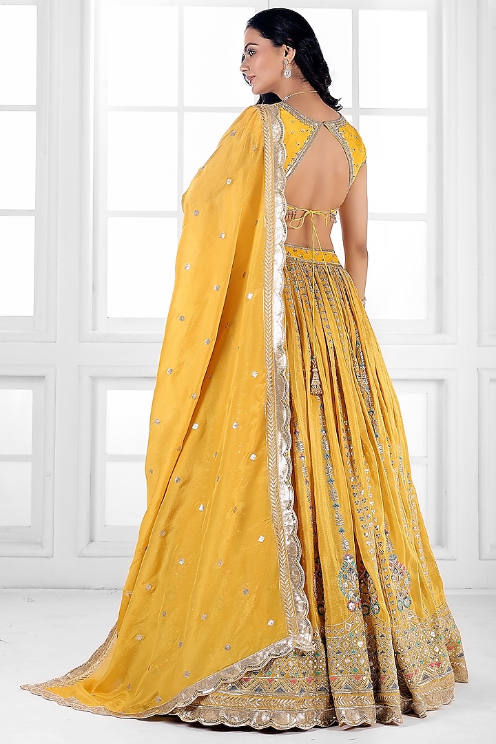 Yellow Tissue Silk Cutdana Embellished Wedding Lehenga Set by AJAY & PRIYANKA at Pernia's Pop Up Shop