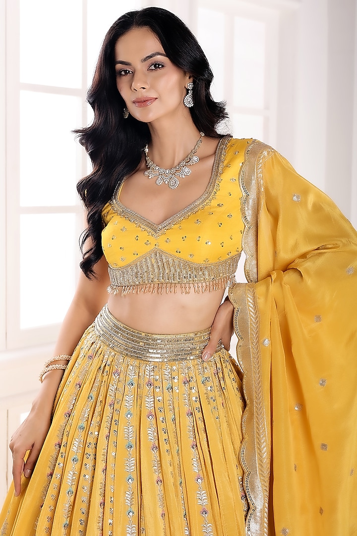 Yellow Tissue Silk Cutdana Embellished Wedding Lehenga Set by AJAY & PRIYANKA at Pernia's Pop Up Shop