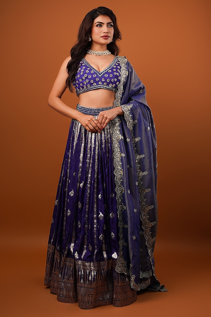 Violet-Blue Silk Brocade Tissue Embellished Lehenga Set by AJAY & PRIYANKA