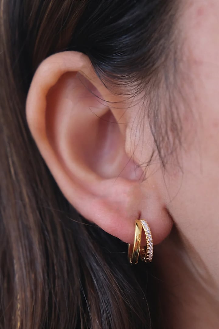 Gold Finish Zircon Hoop Earrings In Sterling Silver by Anushka Jain