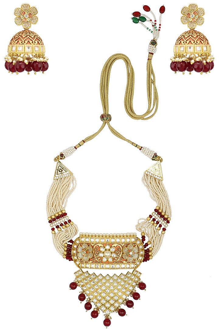 Gold finish kundan and pearl string necklace set available only at Pernia's Pop Up Shop.