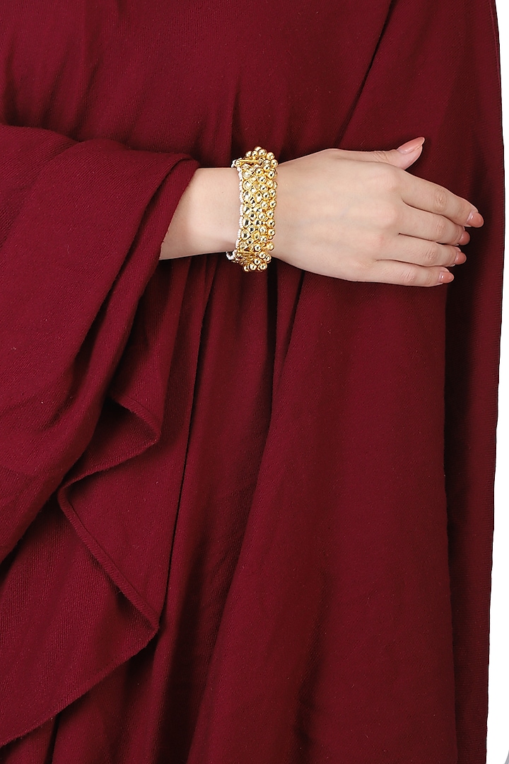 Gold plated kundan and gold beads bracelet by Anjali Jain Jewellery