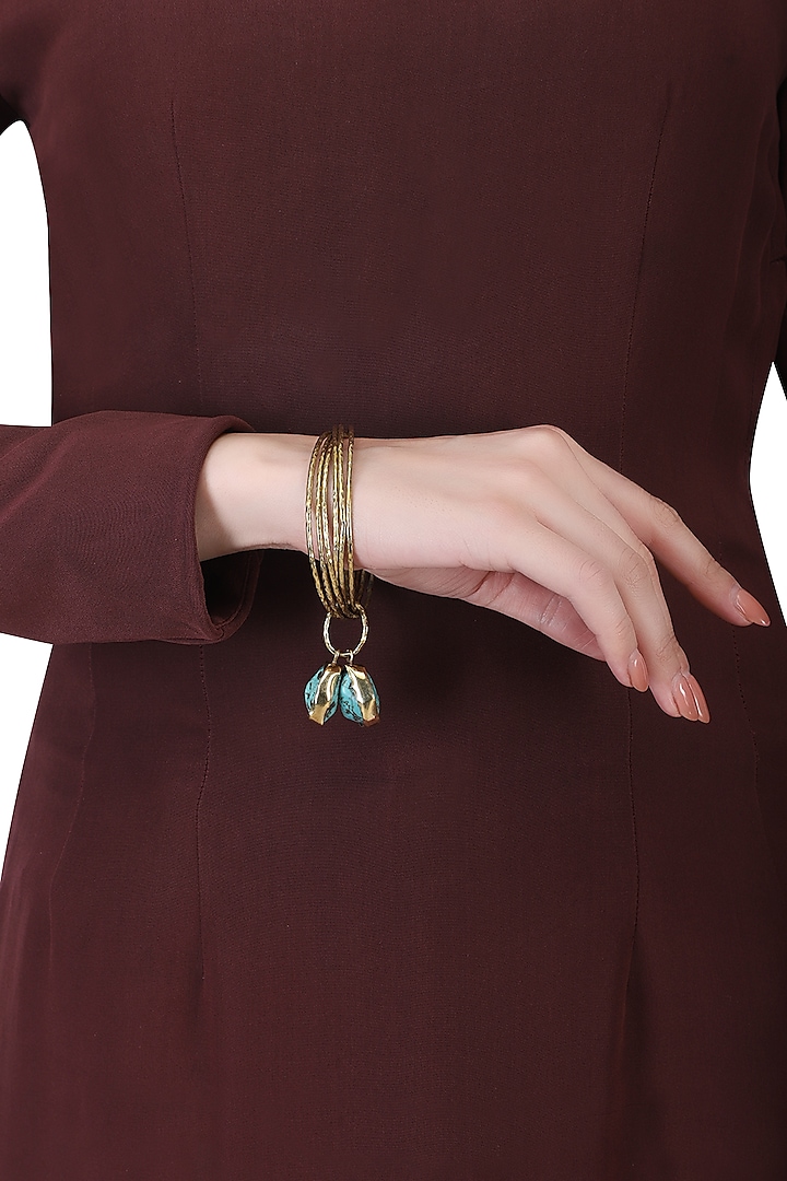 Set of 6 gold plated turquoise stone bangles by Anjali Jain Jewellery