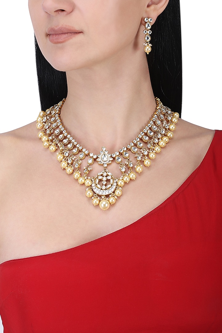 Gold plated kundan and pearls necklace set by Anjali Jain Jewellery