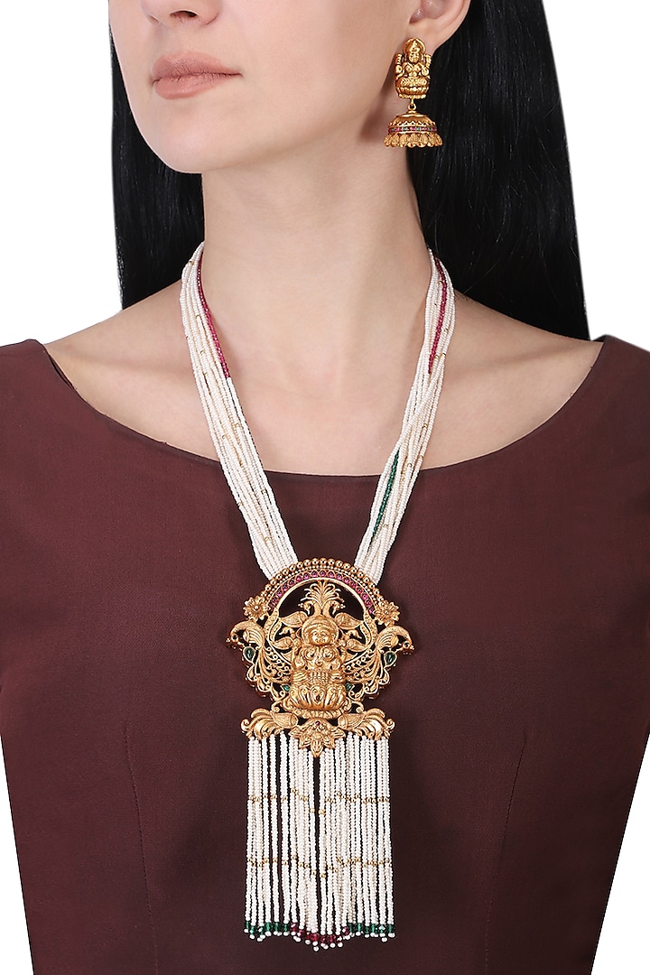 Gold plated pearl strings necklace set by Anjali Jain Jewellery