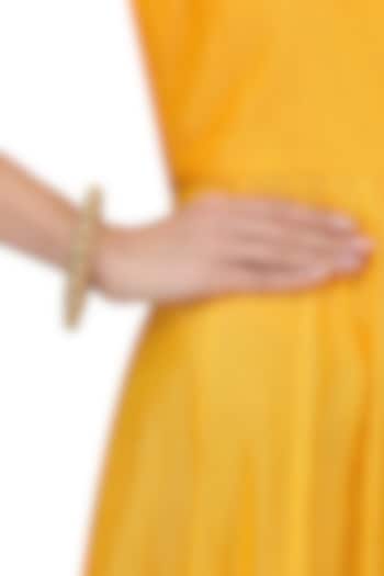 Anjali Jain presents Set of 2 gold finish pearl bangles available only at Pernia's Pop Up Shop.