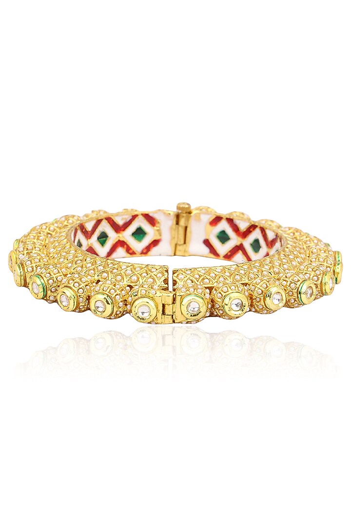 Anjali Jain presents Set of 2 gold finish pearl bangles available only at Pernia's Pop Up Shop.