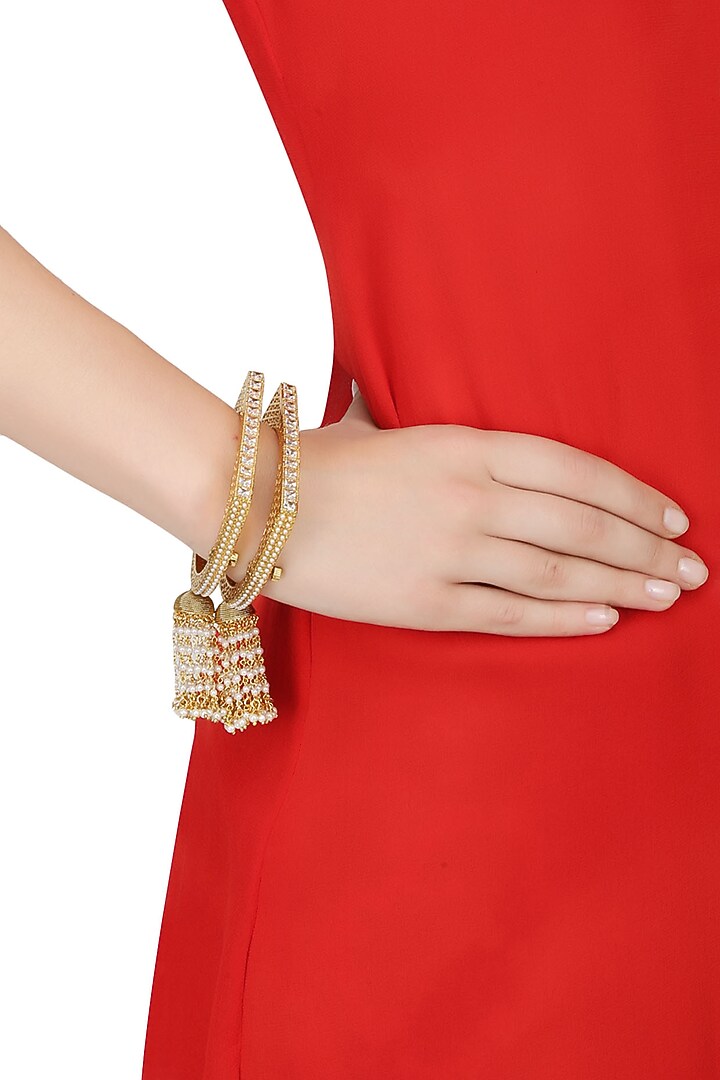 Anjali Jain presents Set of 2 Gold bangles with pearls & polki available only at Pernia's Pop Up Shop.