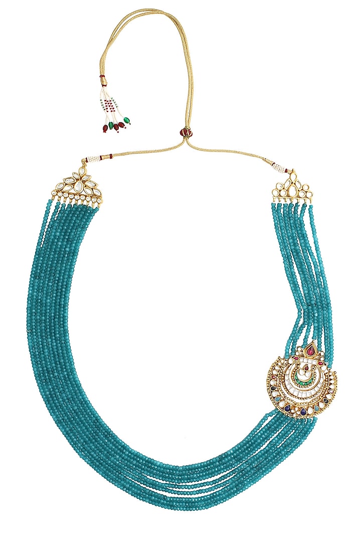 Gold necklace with blue multilayered strings with navrattan side pendant with stones , & polki by Anjali Jain