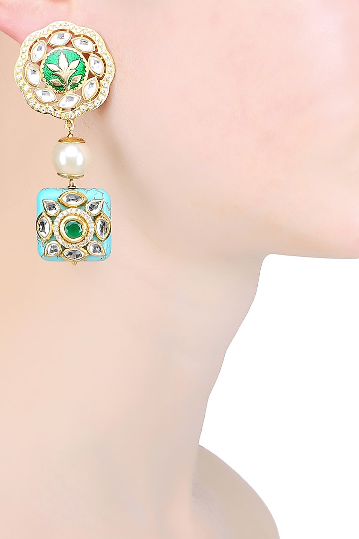 Anjali Jain presents Gold finish enamelled polki and turquoise stone earrings available only at Pernia's Pop Up Shop.