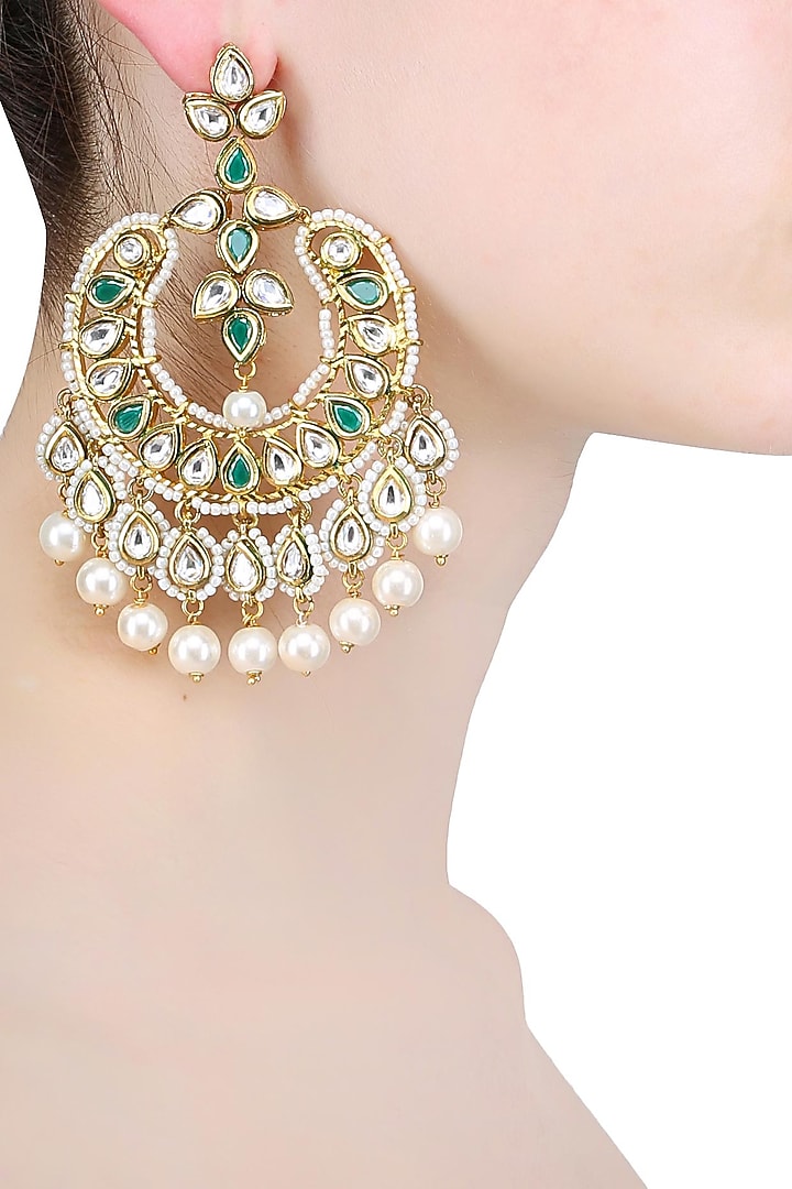 Anjali Jain presents Gold finish polkis, green onyx stone and pearl chandbali earrings available only at Pernia's Pop Up Shop.