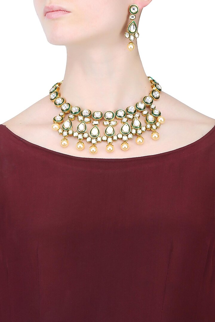 Anjali Jain presents Gold finish kundan and pearls drops jaal necklace set available only at Pernia's Pop Up Shop.