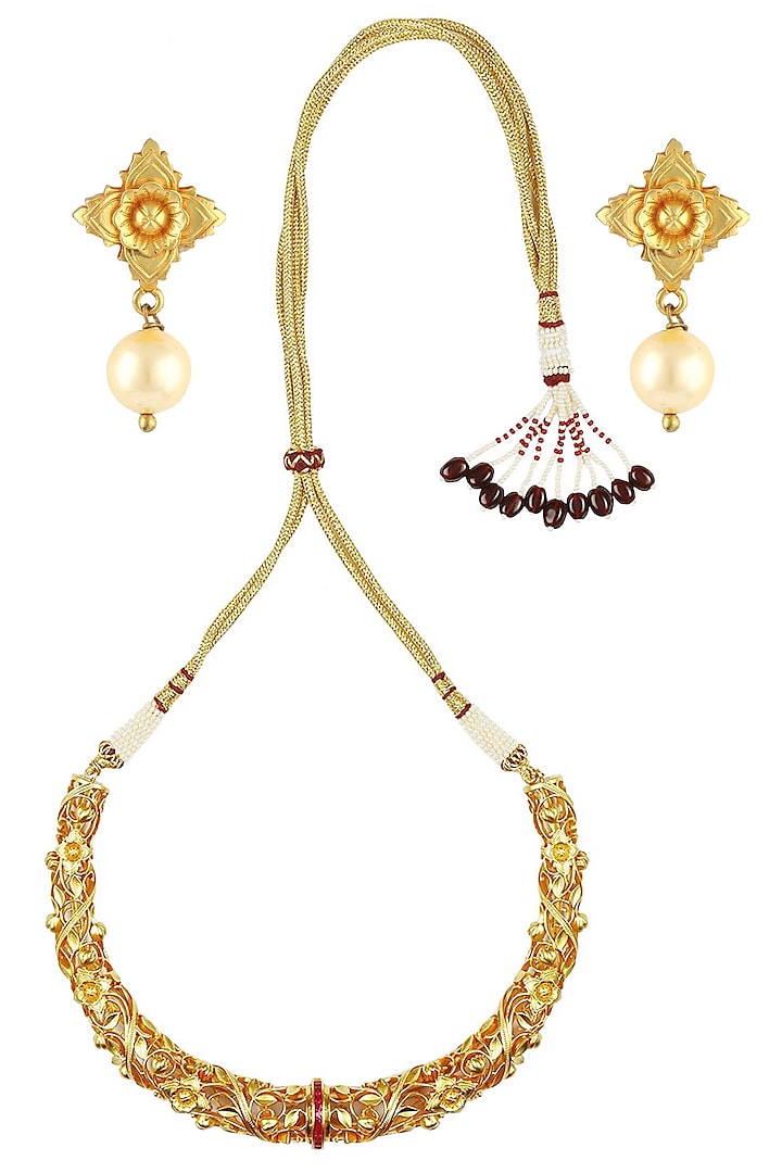 Gold finish filigree ruby stone hasli with flower pearl earrings by Anjali Jain