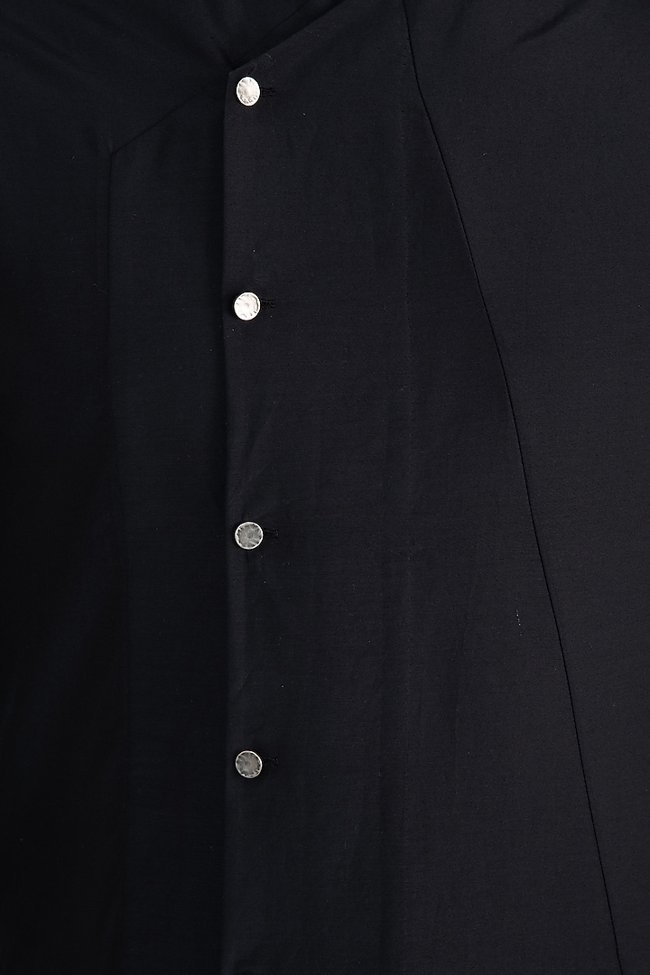 Black structured overlap shirt available only at Pernia's Pop Up Shop.