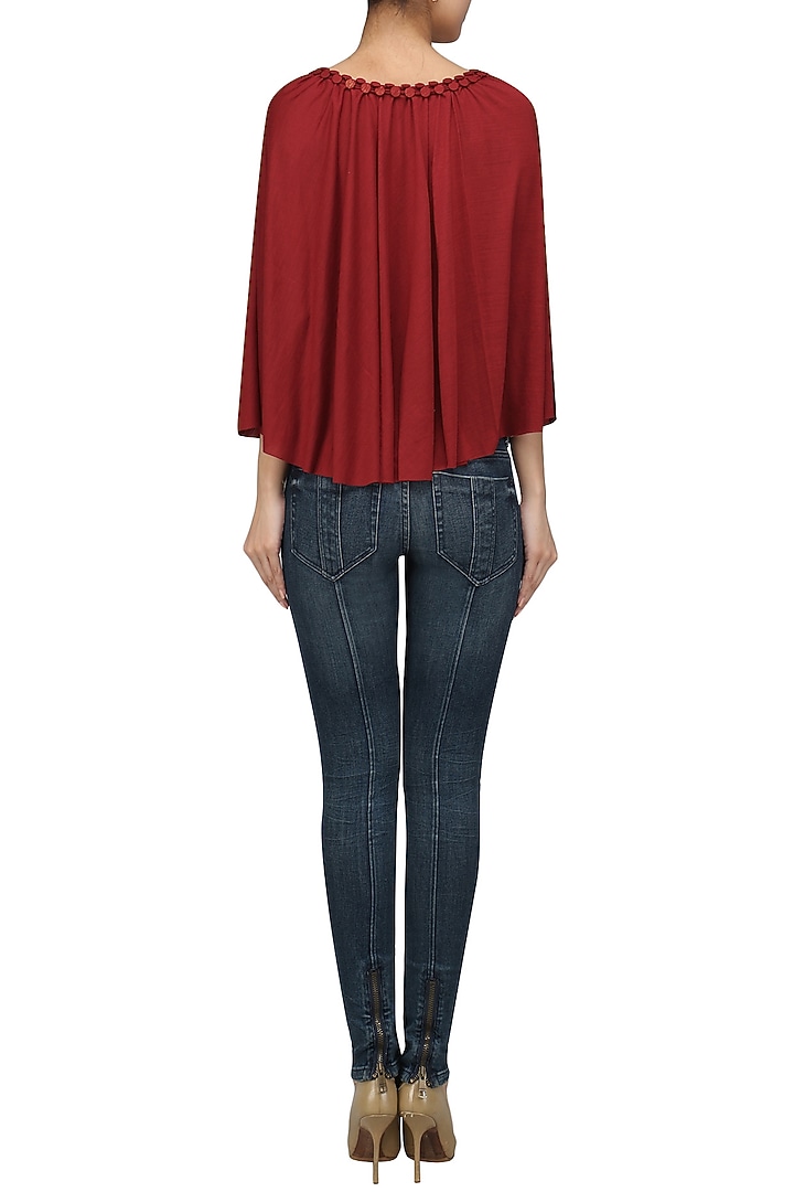 Red embellished poncho available only at Pernia's Pop Up Shop.