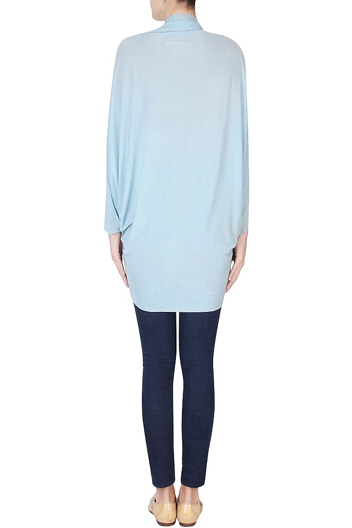 Sky blue sequinned square moon poncho available only at Pernia's Pop Up Shop.