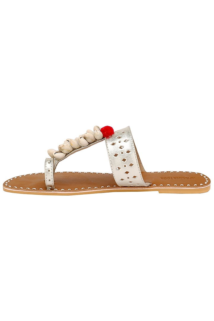 Tan and natural white Classic Kolhapuri Sandal available only at Pernia's Pop Up Shop.