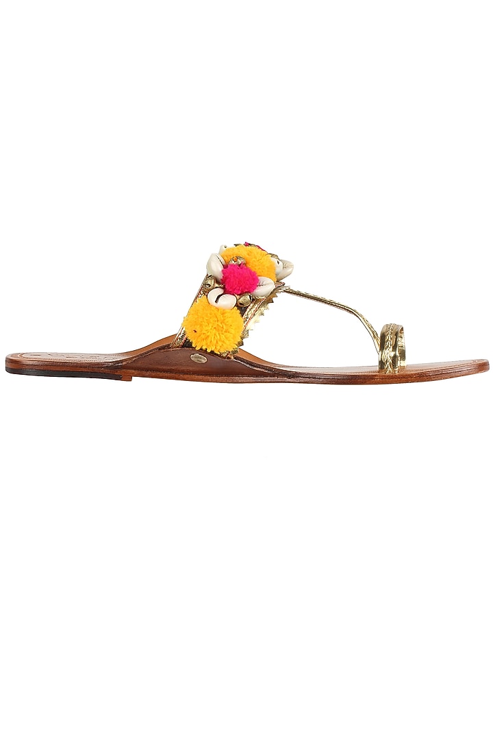 Nude kolhapuri flats with yellow and pink pompoms available only at Pernia's Pop Up Shop.