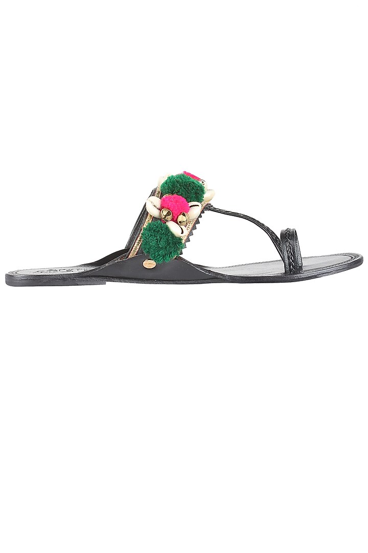 Black kolhapuri flats with green and pink pompoms available only at Pernia's Pop Up Shop.